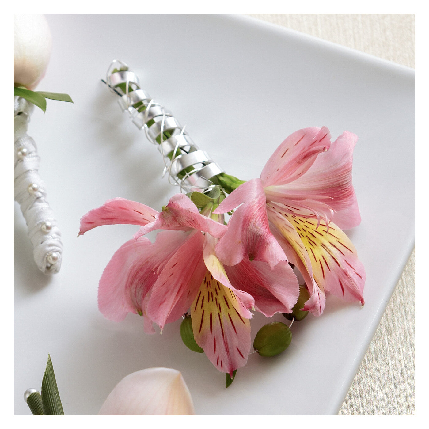 Pink Peruvian Lily Boutonniere